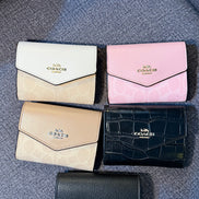 Wallets with straps