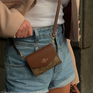 Wallets with straps