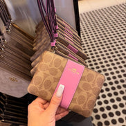 Coach wristlets